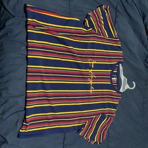 I’m selling all of these shirts, shirts L-XXL.